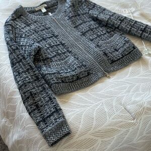 A very stylish cardigan, short/crop length -  perfect for your fall wardrobe.